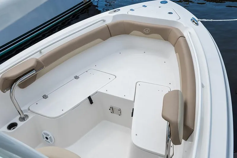 Slide: The Image of Manufacturer Provided Image: 2022 Sailfish 220 CC boat interior with cushioned seating and storage compartments. - 5