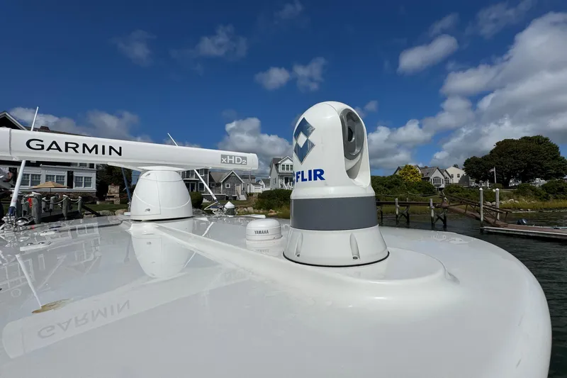 Slide: The Image of 2023 Regulator 34 Center Console with Garmin and FLIR equipment on deck. - 29