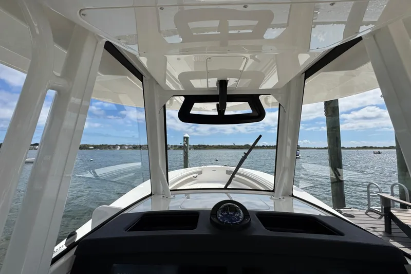Slide: The Image of 2023 Regulator 34 Center Console boat interior with ocean view. - 54