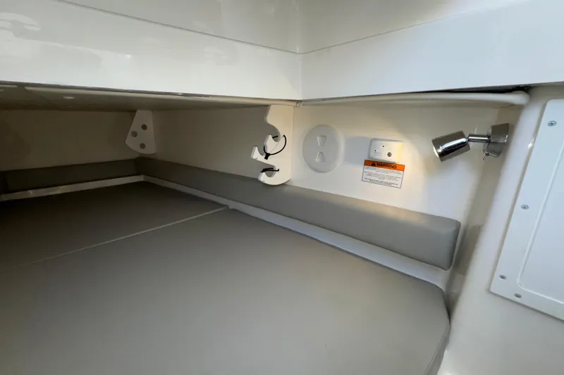 Slide: The Image of 2023 Regulator 34 Center Console cabin interior with modern lighting and sleek design. - 79