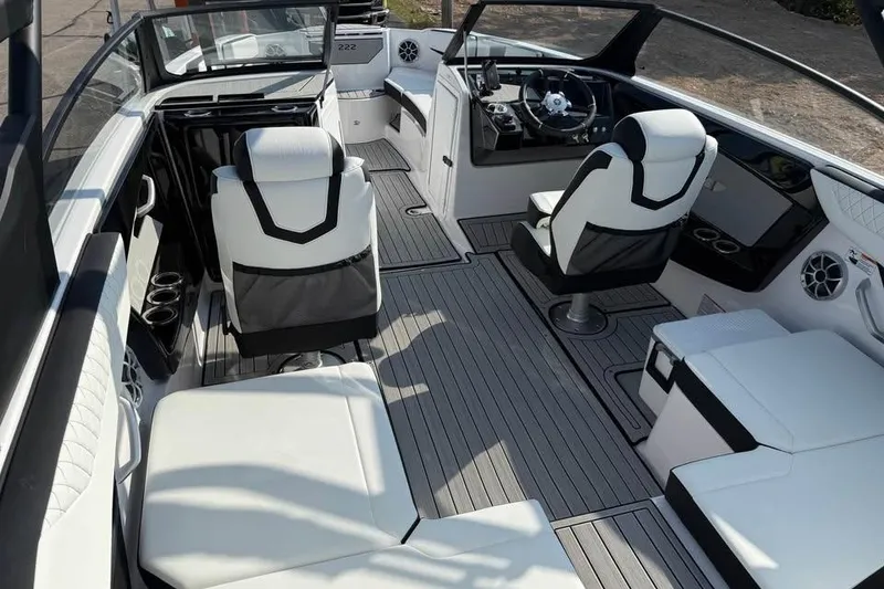 Slide: The Image of 2026 Yamaha Boats 222S interior with sleek seating and modern dashboard design. - 6