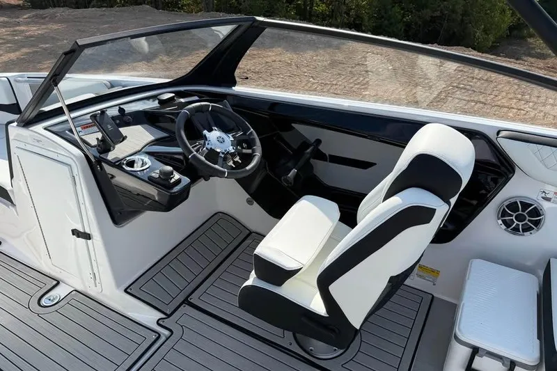 Slide: The Image of 2026 Yamaha Boats 222S cockpit with modern steering and seating design. - 8