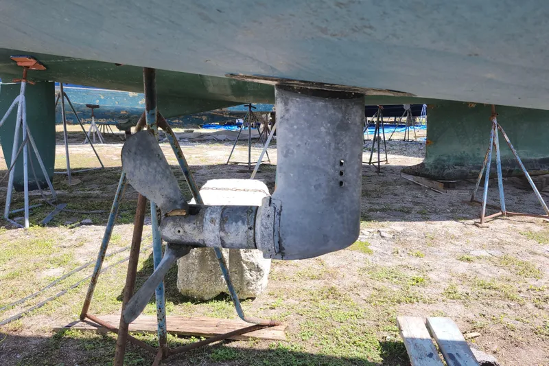 Slide: The Image of Propeller and rudder of a 2001 Bavaria 43 Cruiser sailboat on dry dock. - 16