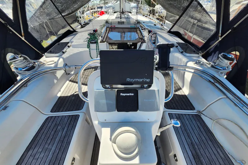 Slide: The Image of Cockpit of 2001 Bavaria 43 Cruiser sailboat with Raymarine navigation system. - 18