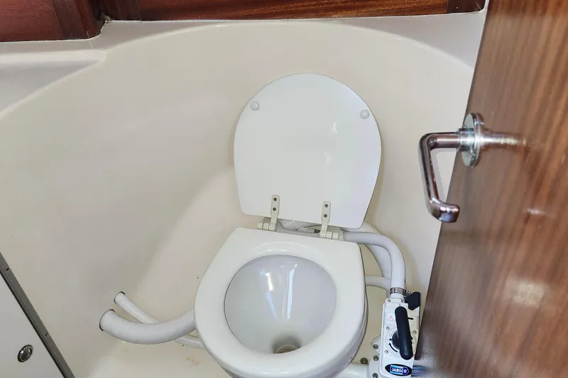 Slide: The Image of Toilet in 2001 Bavaria 43 Cruiser yacht bathroom. - 59