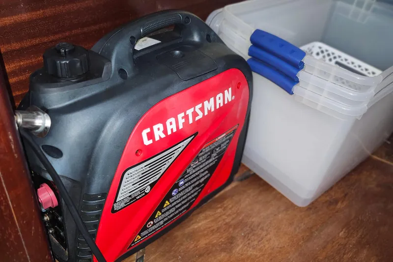 Slide: The Image of Craftsman generator and storage bins on Bavaria 43 Cruiser, 2001 model. - 64