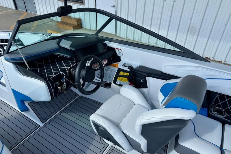 Slide: The Image of Close-up of a 2018 Nautique Super Air Nautique GS20 dashboard display showing 72°F and 11.6 volts. - 12