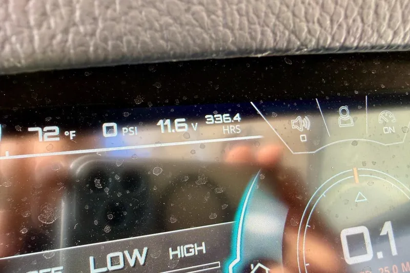 Slide: The Image of Interior of 2018 Nautique Super Air Nautique GS20 boat with cup holders and seating. - 17