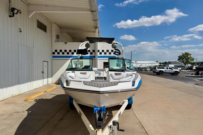 Slide: The Image of 2018 Nautique Super Air Nautique GS20 boat stern and propeller detail. - 2