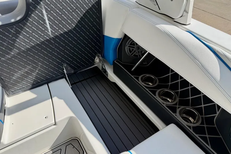 Slide: The Image of 2018 Nautique Super Air Nautique GS20 boat deck with sleek design and chrome details. - 22