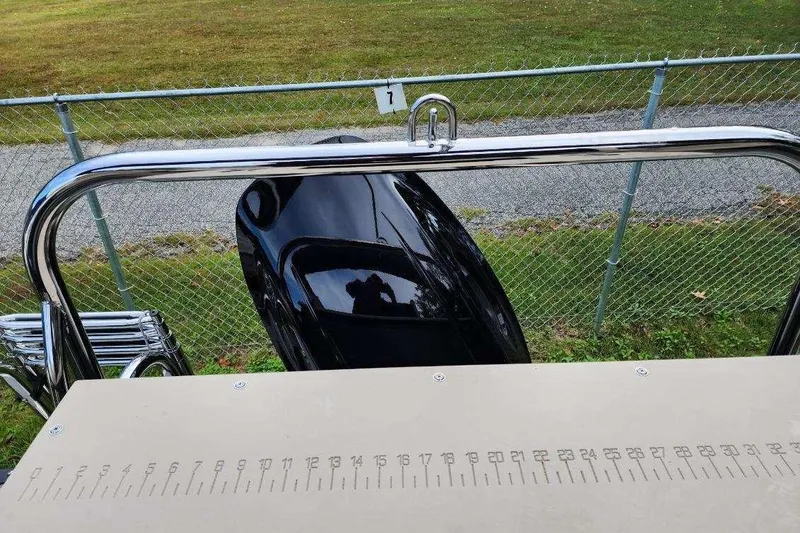 Slide: The Image of 2022 Avalon GS Rear Fish boat with chrome railing and measuring board. - 23