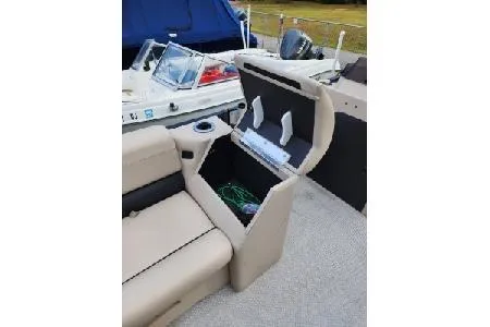Slide: The Image of 2022 Avalon GS Rear Fish boat interior with open storage compartment. - 29