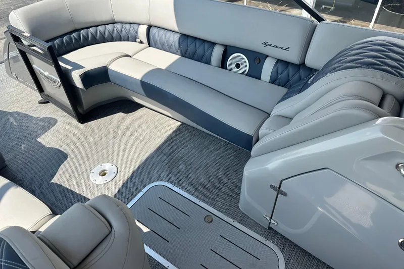 Slide: The Image of 2023 Bennington Q25 boat interior with luxurious seating and modern design. - 10