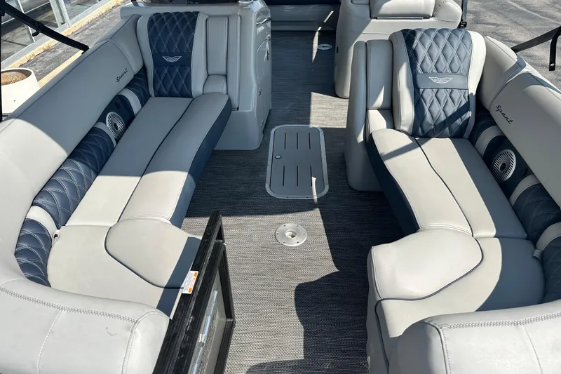 Slide: The Image of Luxurious interior of 2023 Bennington Q25 pontoon boat with plush seating and elegant design. - 11