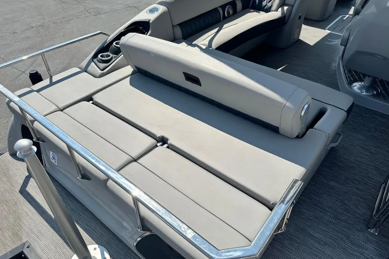 Slide: The Image of 2023 Bennington Q25 boat interior with luxurious seating and cup holders. - 4