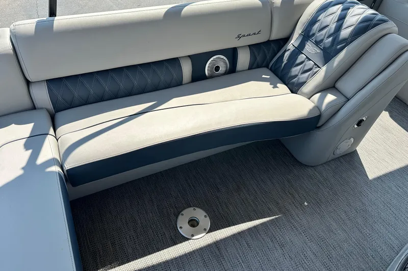 Slide: The Image of 2023 Bennington Q25 boat interior with luxurious seating and stylish design. - 7