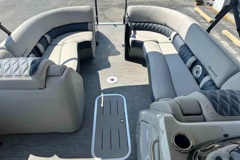 Slide: The Image of Luxurious interior of 2023 Bennington Q25 pontoon boat with plush seating. - 8