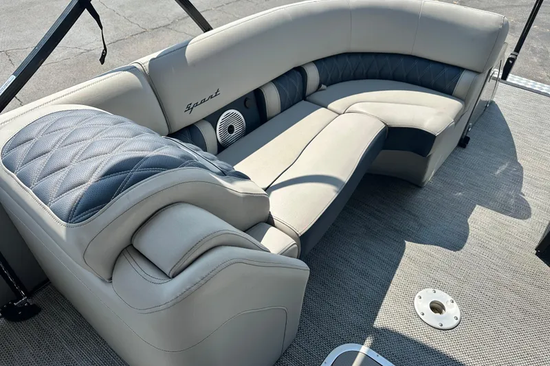 Slide: The Image of Luxurious seating on 2023 Bennington Q25 boat, featuring elegant upholstery and modern design. - 9