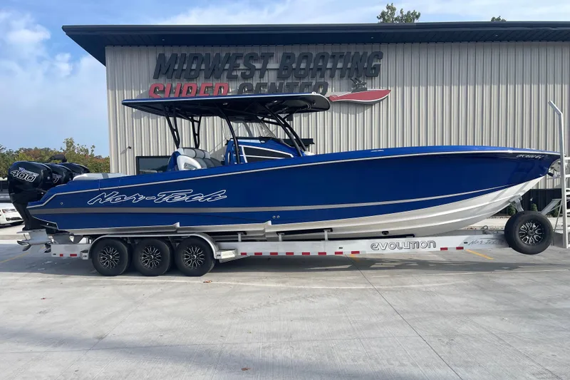 The Image of 2022 Nor-Tech 340 Sport Center Console boat on trailer at Midwest Boating Super Center. - 1