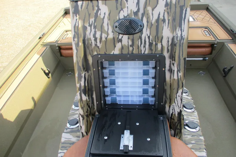 Slide: The Image of 2026 Avid 20 ROGUE CC boat interior with camouflage design and storage compartments. - 11