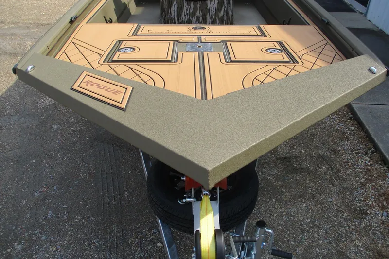 Slide: The Image of 2026 Avid 20 ROGUE CC boat deck with intricate design and "Rogue" branding. - 4