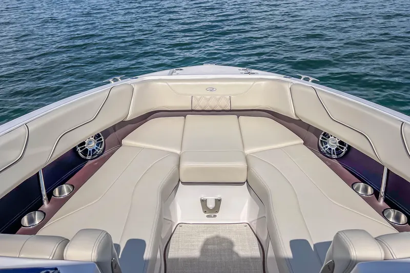 Slide: The Image of Luxurious seating area on 2022 Regal LS6 boat with water view. - 20