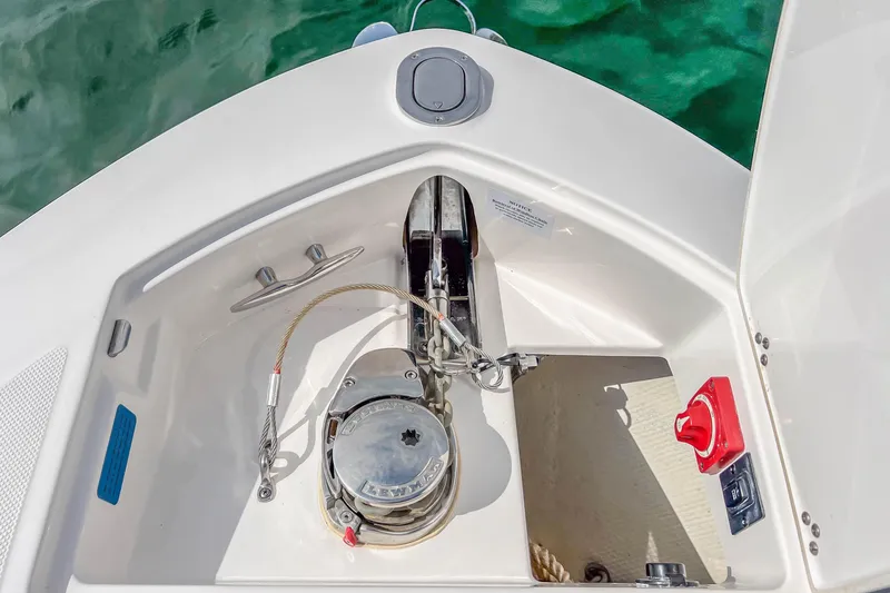 Slide: The Image of Anchor compartment of 2022 Regal LS6 boat with winch and control panel. - 29