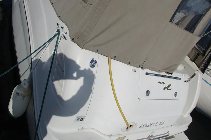 Slide: The Image of 2000 Sea Ray 240 Sundancer boat with cover, docked in Everett, WA. - 5
