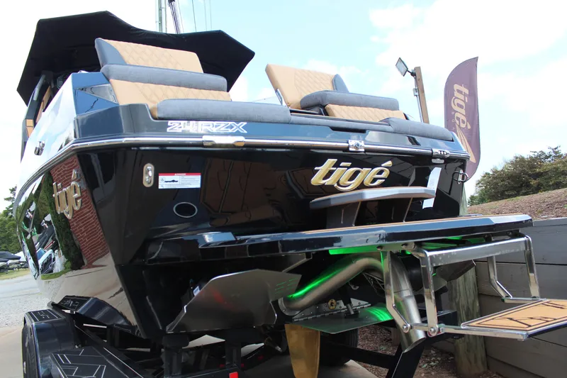 Slide: The Image of 2026 Tigé 24RZX boat with sleek design and luxurious seating. - 10