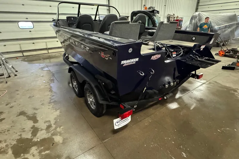 Slide: The Image of 2024 Tracker Targa V-19 Combo emissions control label and identification numbers. - 5