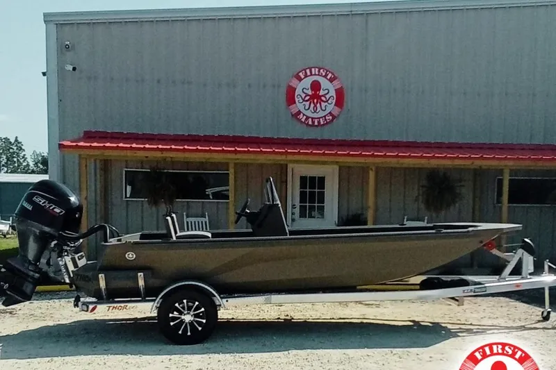 The Image of 2025 Thor 1900 Lake Hammer boat on trailer outside First Mates building. - 1