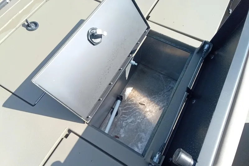 Slide: The Image of Open storage compartment on 2025 Thor 1900 Lake Hammer boat, showing interior details. - 10