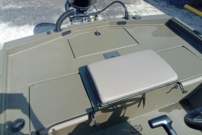 Slide: The Image of Thor 1900 Lake Hammer 2025 boat interior with seating and storage compartments. - 11