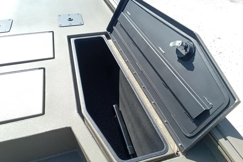 Slide: The Image of Open storage compartment on 2025 Thor 1900 Lake Hammer boat, showcasing interior space. - 14