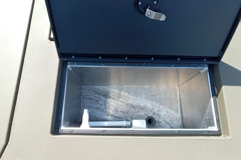 Slide: The Image of Open storage compartment on 2025 Thor 1900 Lake Hammer boat. - 15