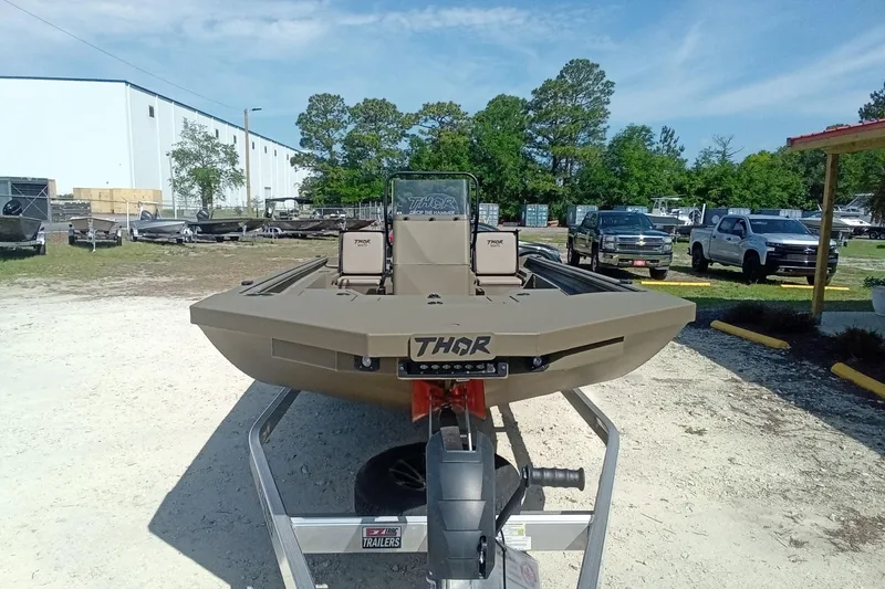 Slide: The Image of 2025 Thor 1900 Lake Hammer boat on trailer in outdoor setting. - 5