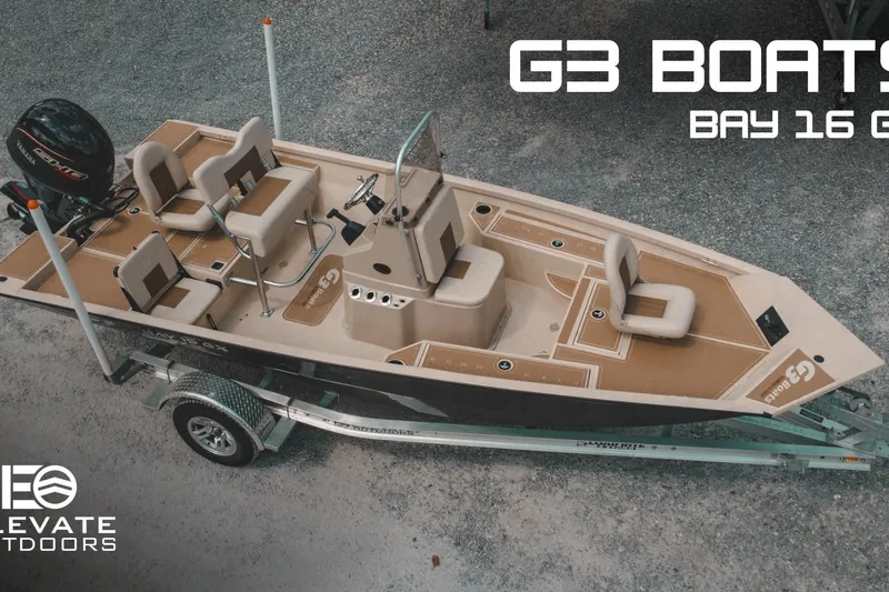 The Image of 2025 G3 Bay 19 GX boat on trailer, featuring spacious seating and Yamaha outboard motor. - 0