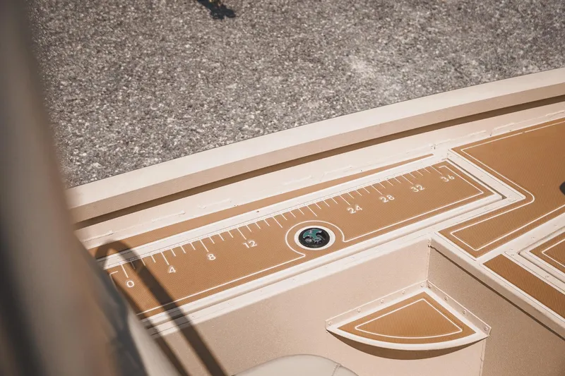 Slide: The Image of 2025 G3 Bay 19 GX boat deck with integrated measuring ruler. - 13