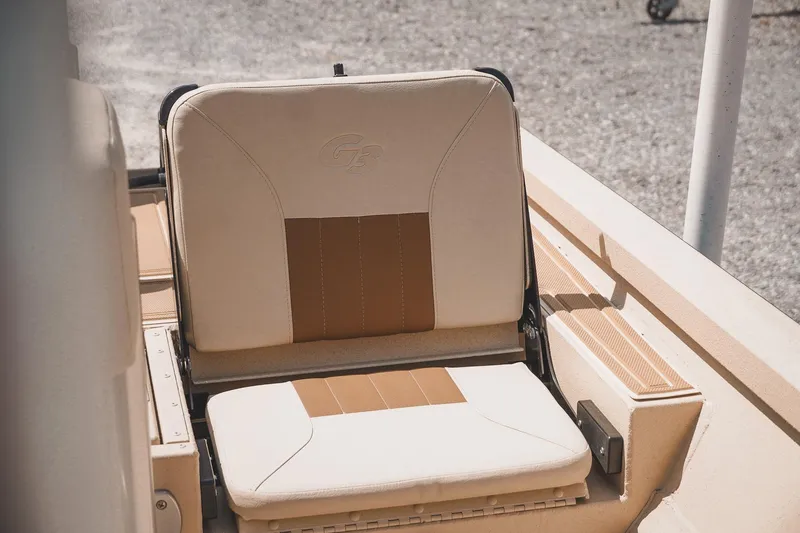 Slide: The Image of 2025 G3 Bay 19 GX boat seat with beige and brown upholstery. - 15