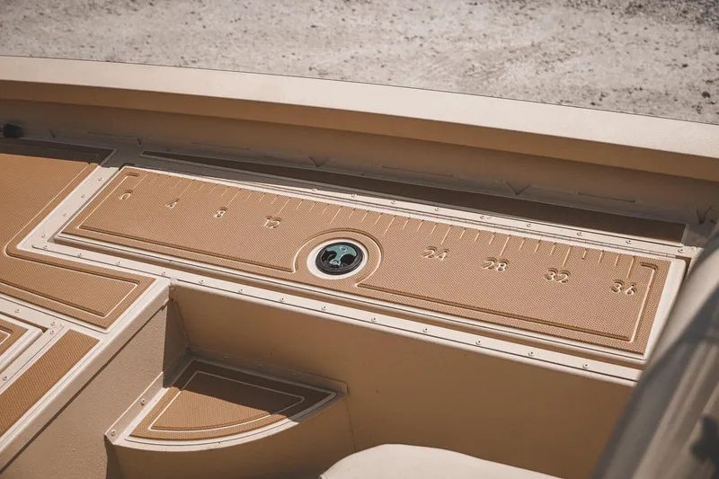Slide: The Image of 2025 G3 Bay 19 GX boat deck with integrated measuring ruler. - 20