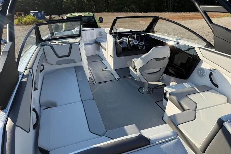 Slide: The Image of 2026 Yamaha Boats AR220 interior with modern seating and sleek design. - 6