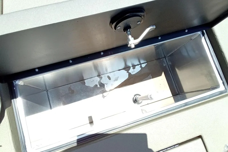 Slide: The Image of Open storage compartment in 2026 Thor 1900 Lake Hammer SC boat. - 28