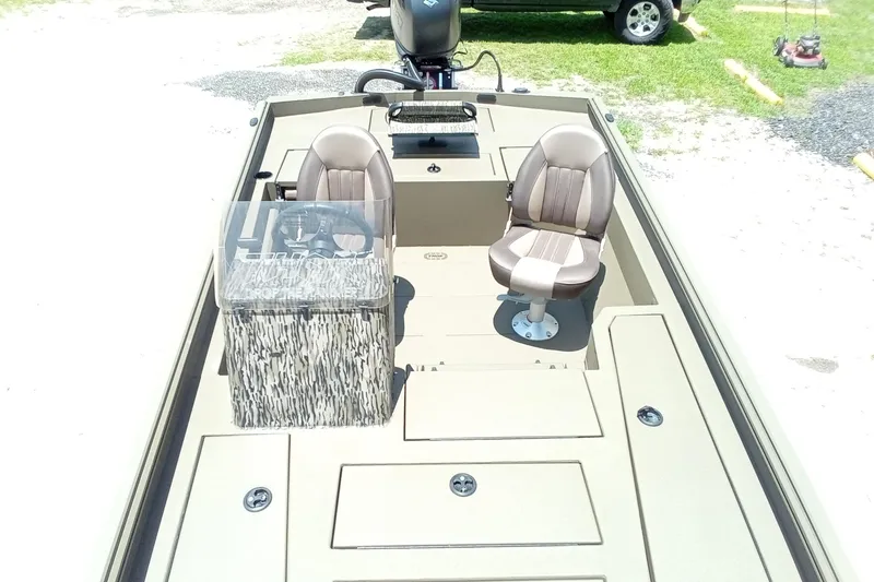 Slide: The Image of 2026 Thor 1900 Lake Hammer SC boat interior with seating and steering console. - 32