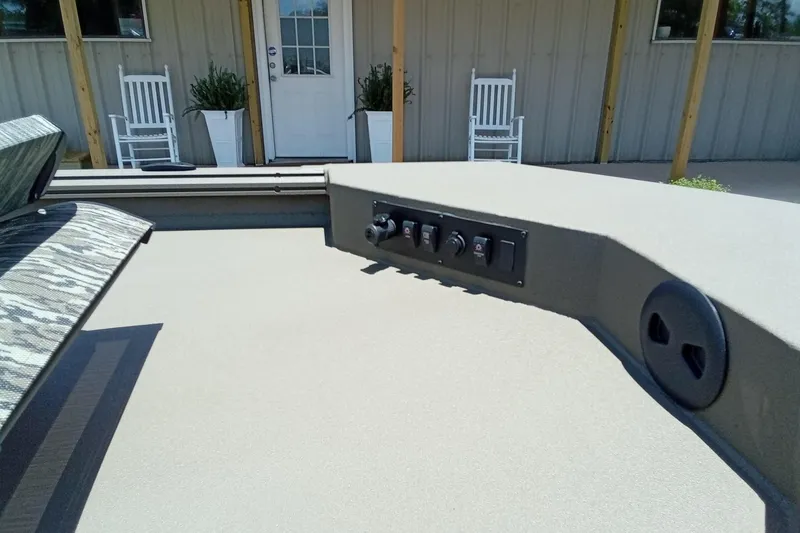 Slide: The Image of 2026 Thor 1900 Lake Hammer SC boat interior with control panel and seating. - 9