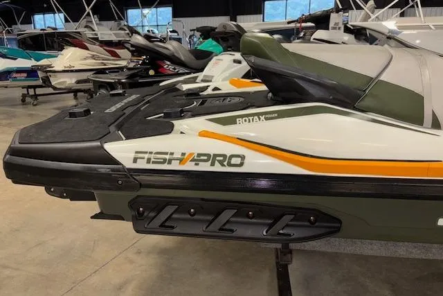 Slide: The Image of 2020 Sea-Doo FISH PRO watercraft in showroom, featuring Rotax engine and sleek design. - 16