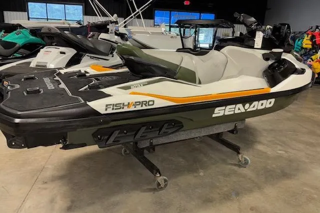 Slide: The Image of 2020 Sea-Doo FISH PRO jet ski on display in showroom. - 9