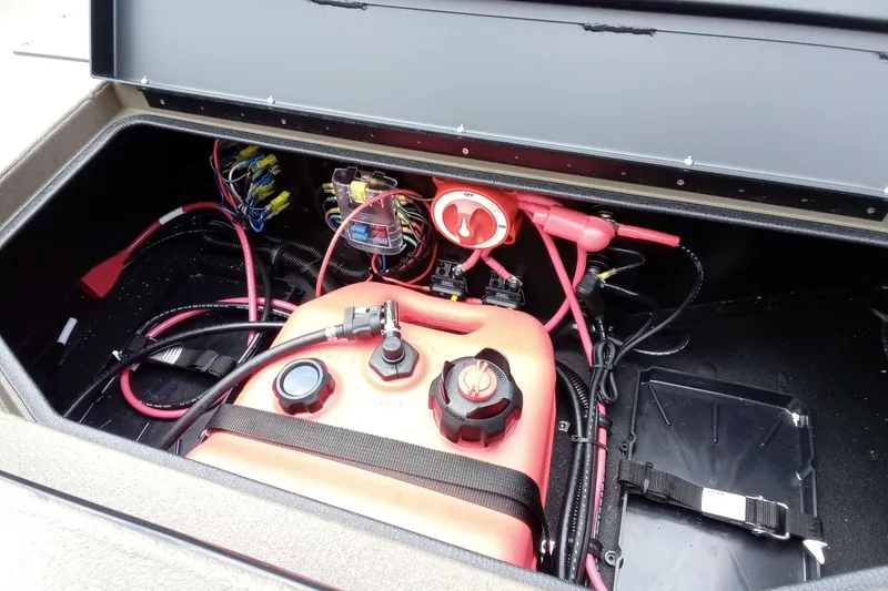 Slide: The Image of Interior of 2026 Thor 1754 Timber Hammer showing wiring and fuel tank setup. - 14