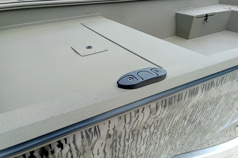 Slide: The Image of 2026 Thor 1754 Timber Hammer boat interior with textured surface and storage compartment. - 7