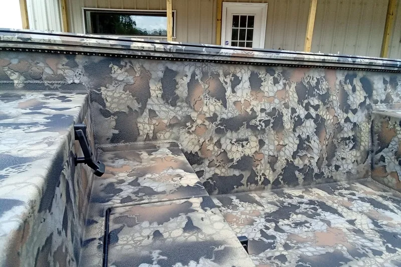 Slide: The Image of Camouflage interior of 2026 Thor 1754 Timber Hammer boat, featuring textured design and sturdy construction. - 10