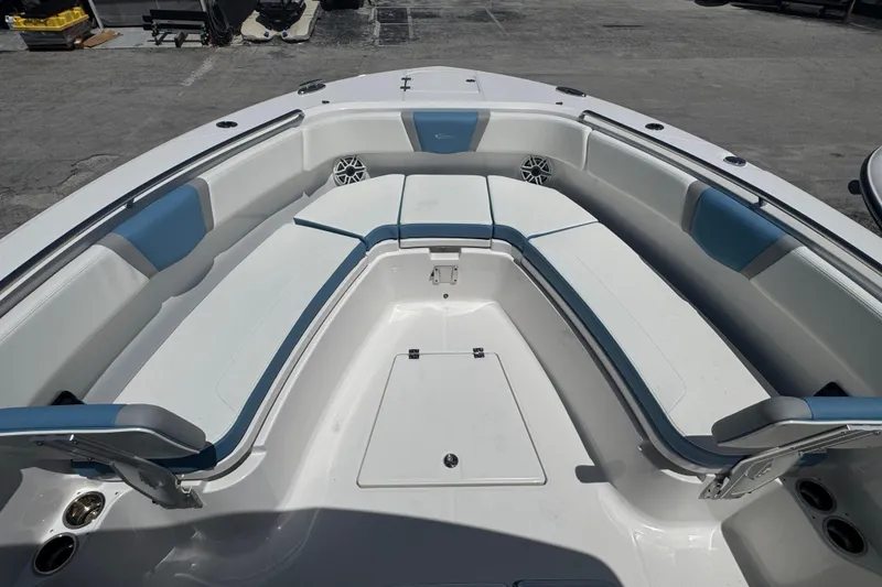 Slide: The Image of 2026 Robalo R300 Center Console boat with spacious seating and modern design. - 30